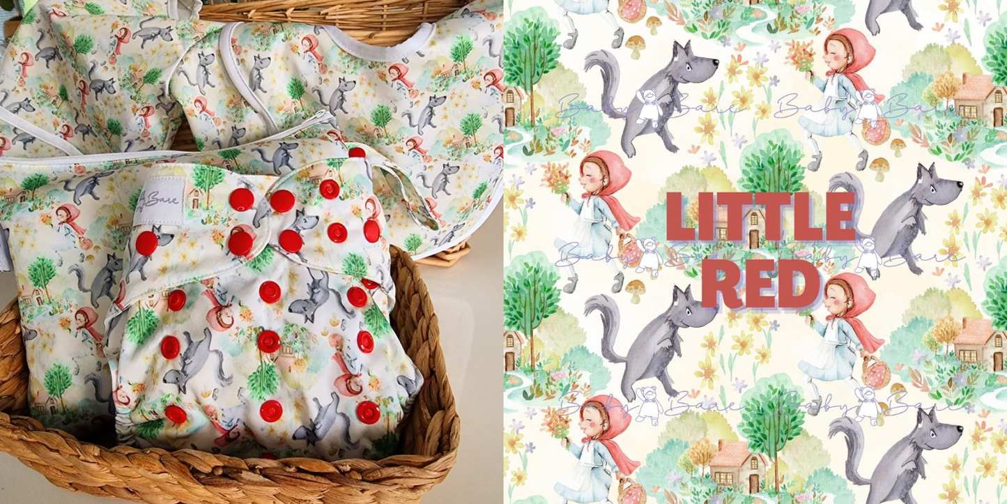 Nursery rhyme cloth nappies, bib & smock