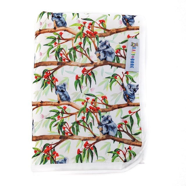 A Change Mat featuring Koalas in a Gum Tree