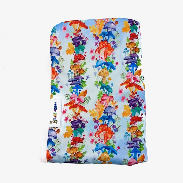 A Change Mat featuring a colourful mushroom pattern