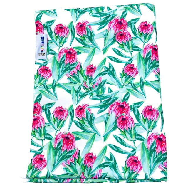 Baby Change Mat with a pink floral print