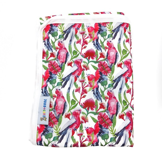 A Change Mat featuring galah birds