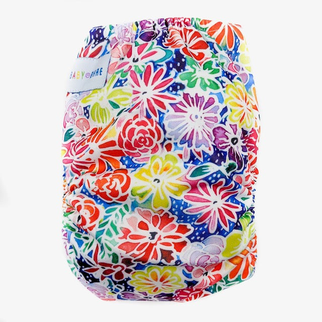 Side snapping cloth nappy featuring a floral print