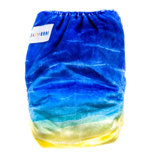 Side snapping cloth nappy featuring a beach print