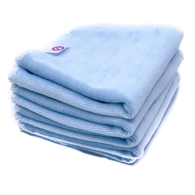 A stack of light blue cloth baby wipes