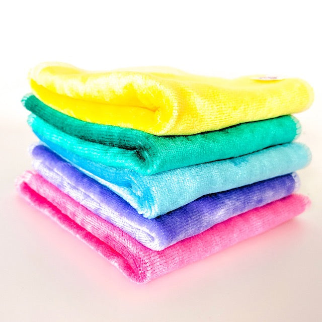 A stack of rainbow coloured cloth baby wipes