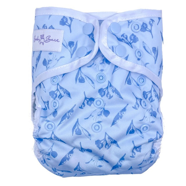 A blue reusable nappy cover featuring a simple gumnut pattern