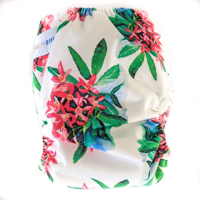 Side snapping cloth nappy featuring a floral print