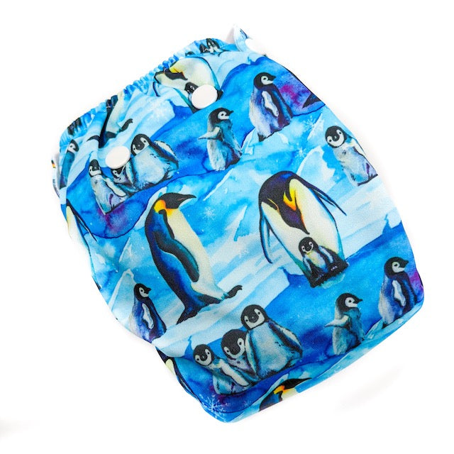 Side snapping cloth nappy featuring a penguin print