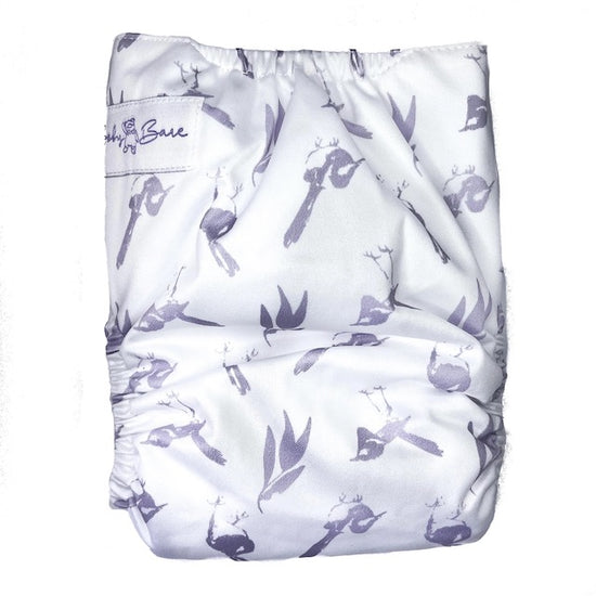 A reusable cloth nappy with lilac wrens on a white base